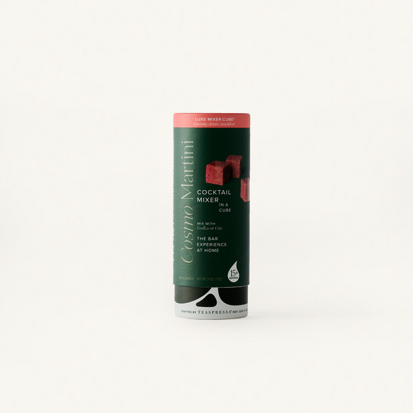 Cosmo Luxe Mixer Cube Tallboy in dark green cylindical packaging.