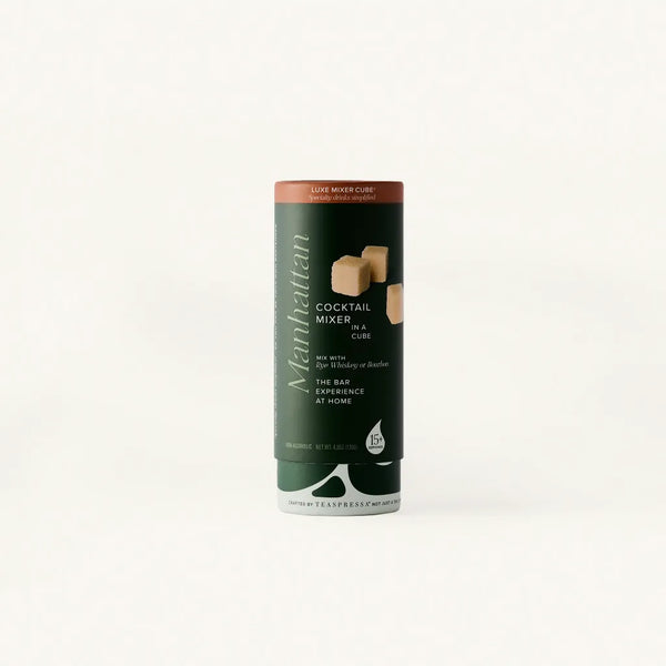 Manhattan Cocktail Mixer Tallboy in Dark green cylindical packaging.