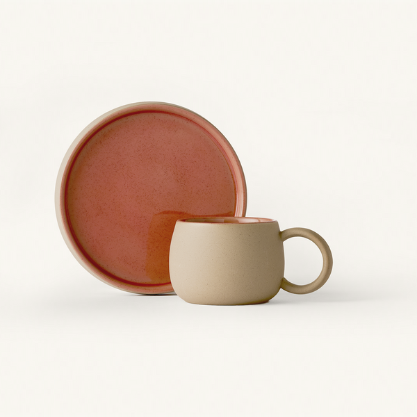 Textured Stone mug and Saucer with smooth rose glaze on inside and top surface.