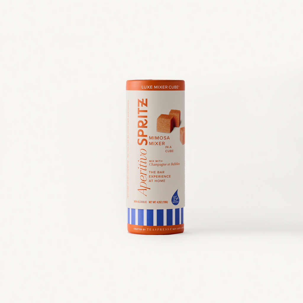 Aperitivo Spritz Mimosa mixer tallboy on an off white background