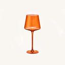 Aura Amber Wine Glass on a clean off white background