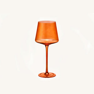 Aura Amber Wine Glass on a clean off white background