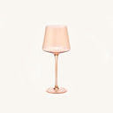 Aura Tan Wine Glass on a clean off white background
