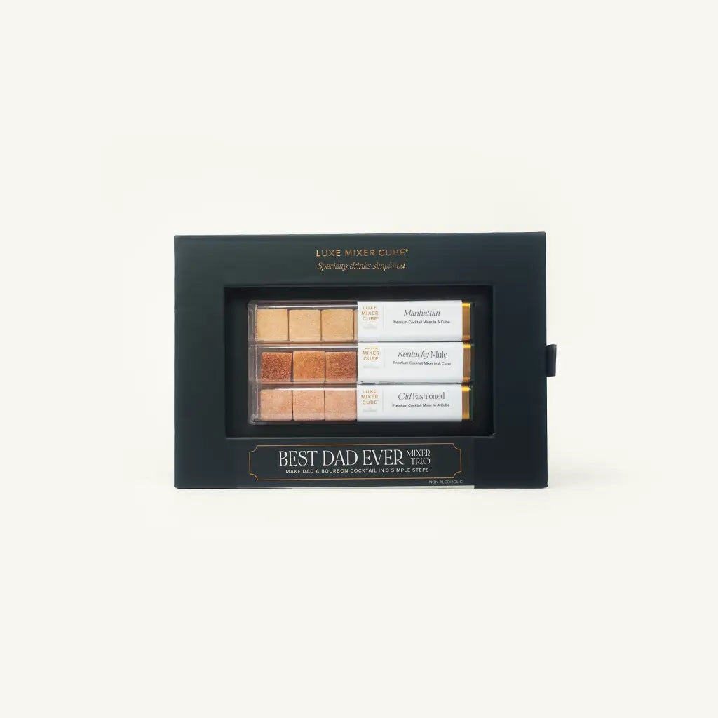 A black gift box labeled BEST DAD EVER displays a set of drink mixers and garnishes in various shades, with labeled sections for Manhattan, Kentucky Mule, and Old Fashioned recipes.