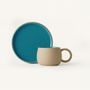 Textured Stone mug and Saucer with smooth Blue glaze on inside and top surface.