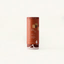 Cinnamon Hazelnut Luxe Mixer Cube tallboy in Rust packaging over clean off white background.