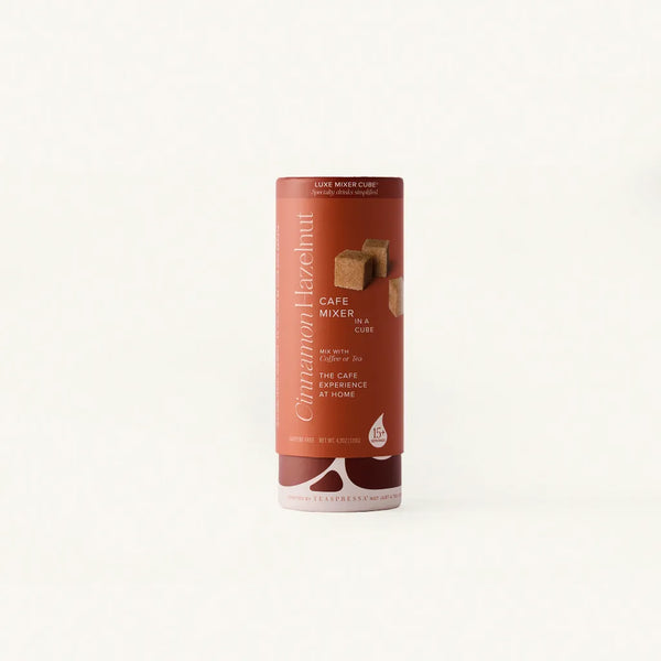 Cinnamon Hazelnut Luxe Mixer Cube tallboy in Rust packaging over clean off white background.