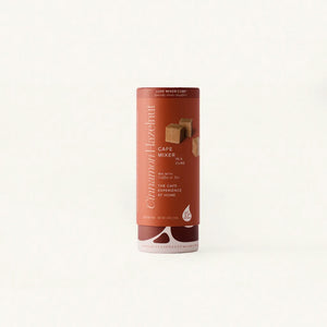 Cinnamon Hazelnut Luxe Mixer Cube tallboy in Rust packaging over clean off white background.