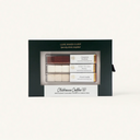 A boxed set labeled Clubhouse Coffee Café Set containing flavored drink cubes in three varieties: Cinnamon Brown Sugar, White Chocolate Mocha, and French Vanilla, displayed in a green and cream package.