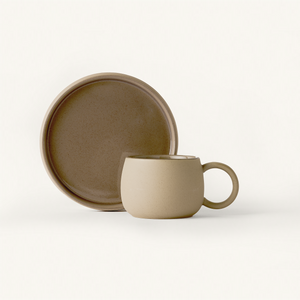 Textured Stone mug and Saucer with smooth dark grey glaze on inside and top surface.
