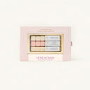 Mom-Mosa makeup set with pastel shades in a pink box on a white background