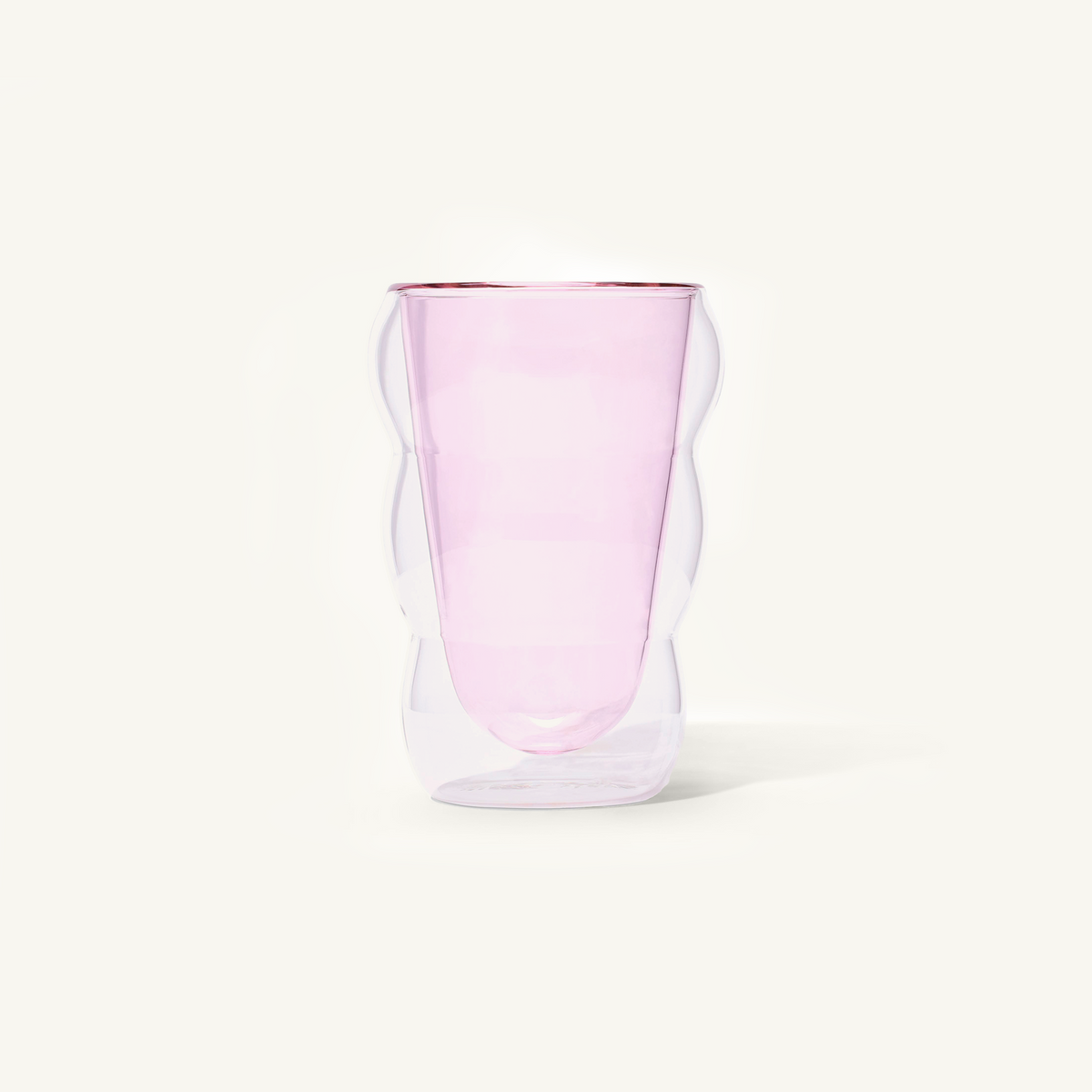 Double walled Pink Cloud Cup on an off white background.